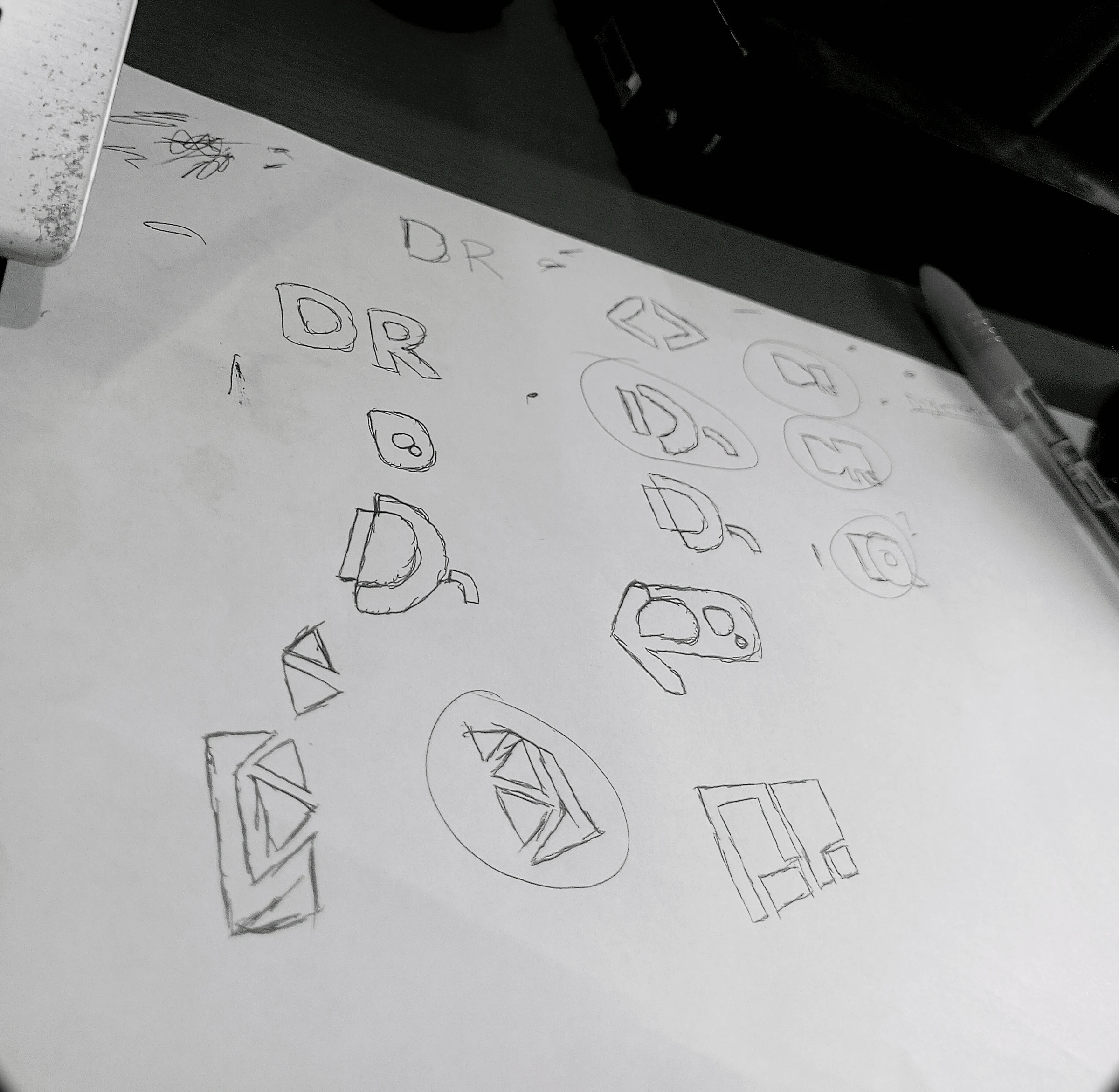 Hand-drawn geometric logo explorations for Digi-Realm