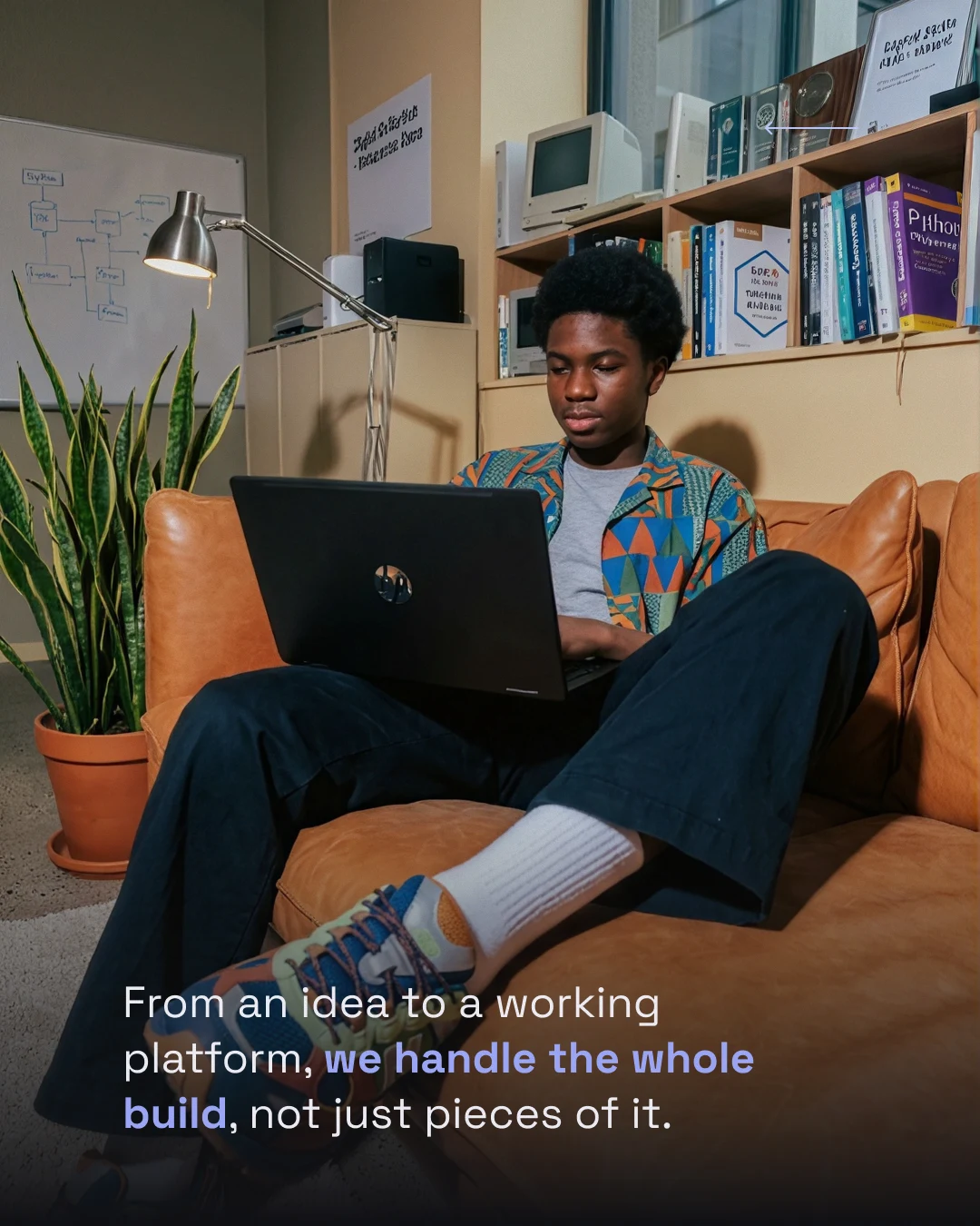 Digi-Realm social artwork showing a person working on a laptop